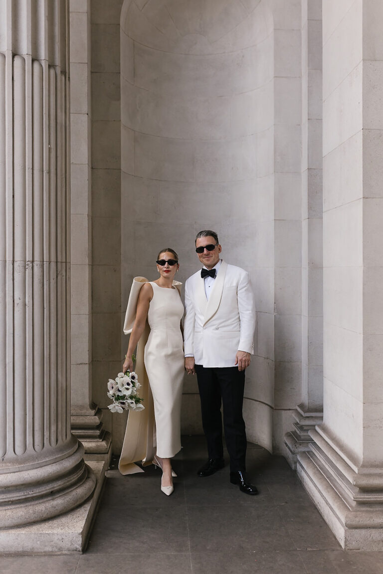 A bride and groom look chic for portraits, a perfect example of brilliant City Wedding Photography